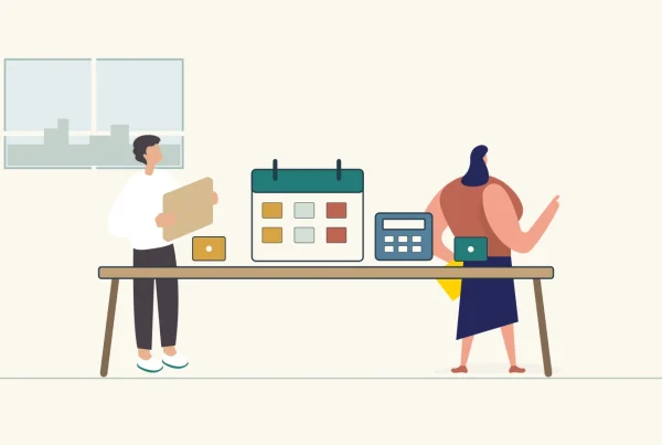 Two organisers plan an event using a calendar, calculator and activity cards.