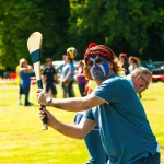 Participant playing Puc Fada during Celtic Games