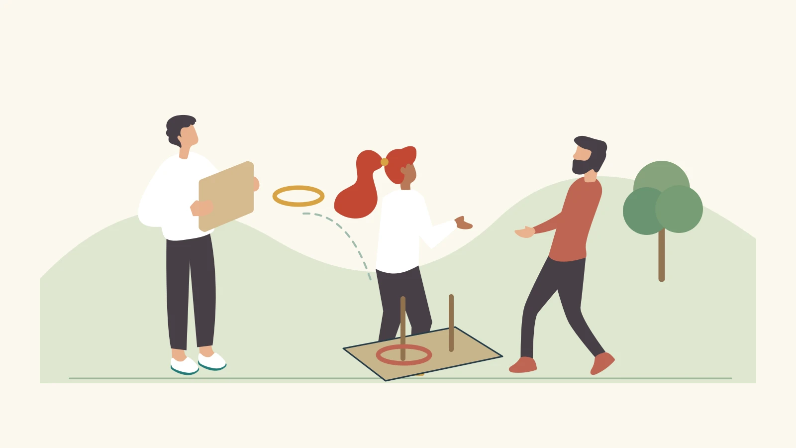 Colleagues take part in a traditional ring-toss team challenge on grass.