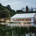 Gillies Island Pavilion marquee beside the water at Glenpark Estate