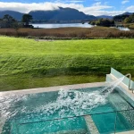 Outdoor thermal pool overlooking Lough Leane at The Lake Hotel in Killarney