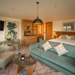 Suite with bedroom and seating area at Pembroke Kilkenny