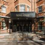 Exterior facade and entrance of The Malone Hotel on Eglantine Avenue in Belfast